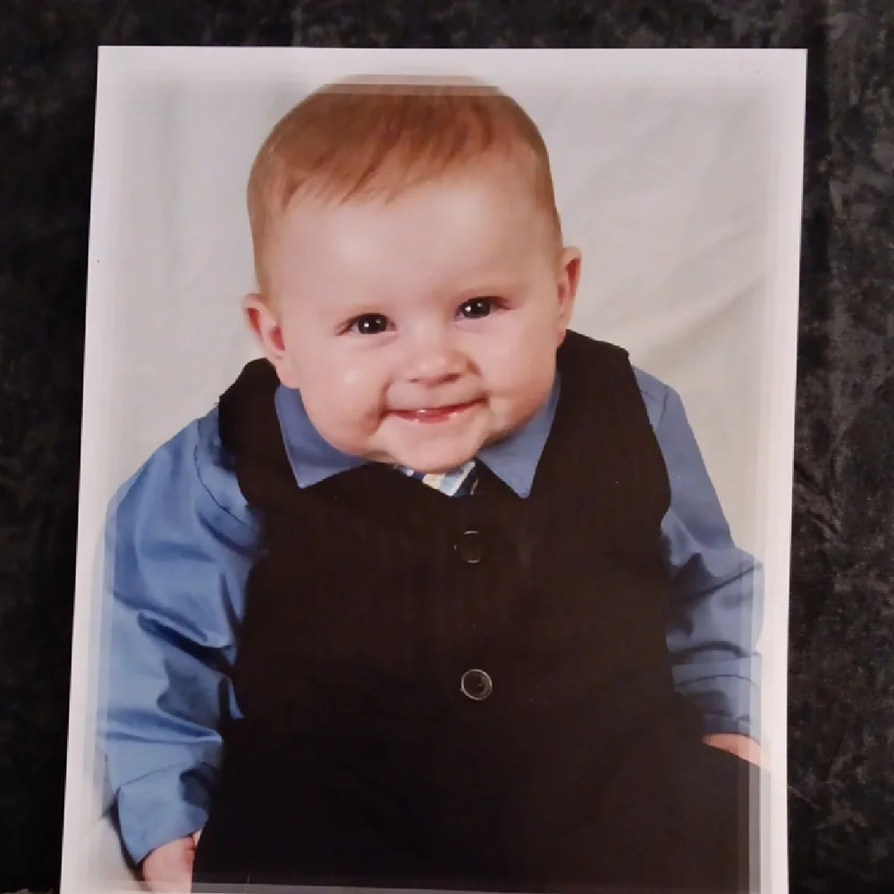 Black button up pinstripe vest